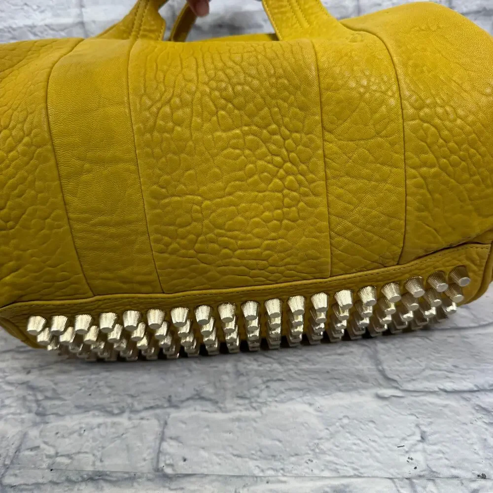 Alexander Wang Rocco Duffel Bag Mustard Yellow Pebbled Leather Studded Bottom